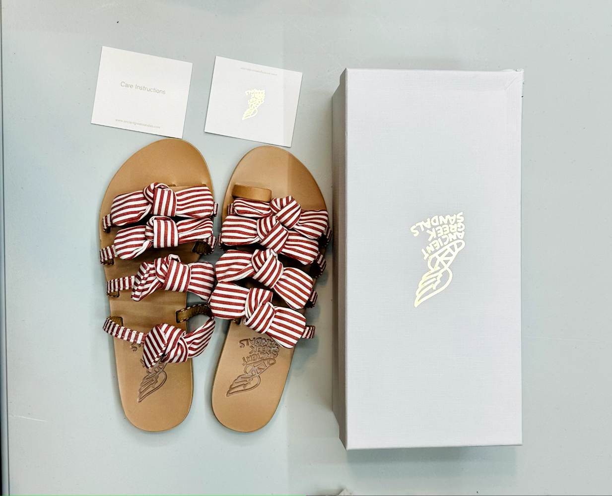 ANCIENT GREEK Sandal Hara bow-embellished leather slides size 38 pink $325